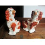 A PAIR OF STAFFORDSHIRE DOGS 30cm high