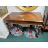 A VICTORIAN MAHOGANY OCCASIONAL TABLE the rectangular top above a plain apron on ring turned legs