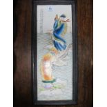 A CHINESE PORCELAIN FRAMED PANEL depicting figures in a landscape 40cm x 15cm