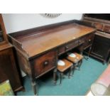 A GEORGIAN MAHOGANY SIDEBOARD with three quarter gallery frieze drawers and turned fluted tapering