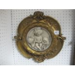 A PAIR OF COMPOSITION PLAQUES each of circular form in gilt frames 36cm diameter