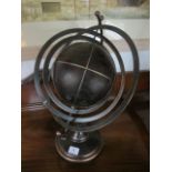 A BRONZED ARMILLARY SUNDIAL raised on a circular spreading foot 52cm high