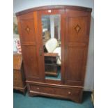 AN EDWARDIAN MAHOGANY INLAID WARDROBE with mirrored door the base containing a drawer