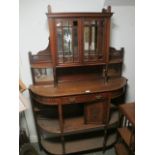 AN EDWARDIAN MAHOGANY CHIFFONIER the bevelled glass doors with turned supports (A/F) 181cm (h) x