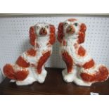 A PAIR OF STAFFORDSHIRE DOGS 30cm high