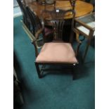 A GEORGIAN MAHOGANY ELBOW CHAIR with pierced vertical splat above an upholstered drop in seat on