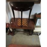 A TEAK RECTANGULAR OCCASIONAL TABLE together with a chess board,