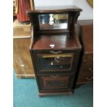 AN EDWARDIAN MAHOGANY MUSIC CABINET the super structure with open compartment and mirror back above