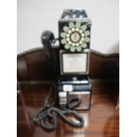 A BAKELITE MODEL OF AN EARLY AMERICAN CALL PHONE