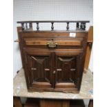 A LATE VICTORIAN MAHOGANY HANGING CUPBOARD with Gothic panelled doors