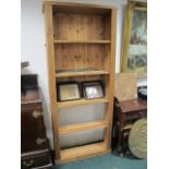 A PINE FIVE TIER OPEN FRONT BOOKCASE with reeded pilasters 198cm (h) x 80cm (w) x 33cm (d)