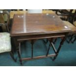 A MAHOGANY OCCASIONAL TABLE the rectangular moulded top raised on moulded legs joined by stretchers