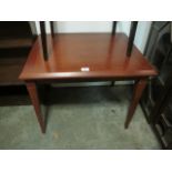 A TEAK RECTANGULAR OCCASIONAL TABLE on square tapering legs 58cm (h) x 71cm (w) x 56cm (d)