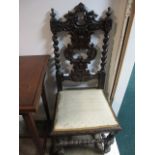 A VICTORIAN CARVED OAK SINGLE CHAIR with pierced back and turned supports
