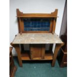 AN ARTS AND CRAFTS MAHOGANY MARBLE TOP WASH STAND with cupboard on moulded legs 129cm (h) x 106cm