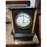 A BLACK SLATE AND MARBLE MANTEL CLOCK 19th Century of rectangular outline with enamel dial and