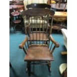 A PAIR OF BEECHWOOD ROCKING CHAIRS