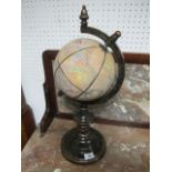 A MODERN MODEL OF A GLOBE on a typical black stylized base 55cm high