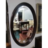 A CHERRYWOOD OVAL FRAME BEVELLED GLASS MIRROR 56cm (h) x 40cm (w)