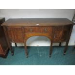 A GEORGIAN STYLE MAHOGANY BOWED SIDEBOARD 19th Century the shaped top with reeded rim above a