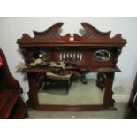 AN EDWARDIAN MAHOGANY COMPARTMENT OVERMANTEL MIRROR with bevelled glass plates and moulded shelves