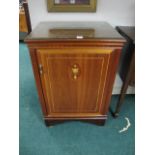 A MAHOGANY INLAID SIDE CABINET with panelled door on bracket feet 98cm (h) x 68cm (w) x 54cm (d)