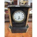 A BLACK SLATE AND MARBLE MANTEL CLOCK 19th Century of rectangular outline with enamel dial and