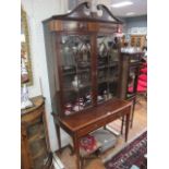 A MAHOGANY AND MARQUETRY INLAID DISPLAY CASE early 19th century the broken arched pediment