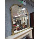 A VICTORAIN STYLE GILT OVERMANTEL MIRROR the moulded frame with rounded corners headed by a shell