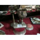 A VICTORIAN SILVER EMBOSSED GOBLET together with a silver pin cushion and candle stick etc