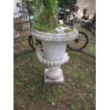 A VICTORIAN WHITE PAINTED CAST IRON JARDINIERE of large proportions the circular bowl with a