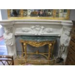 AN EXTREMELY FINE AND IMPRESSIVE WHITE MARBLE CHIMNEY PIECE the rectangular bowed shelf above a