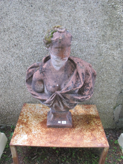 A VICTORIAN TERRACOTTA BUST OF JULIUS CAESAR on a rectangular socle 87cm