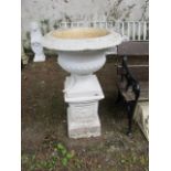 A PAIR OF VICTORIAN WHITE PAINTED CAMPANA SHAPED GARDEN URNS flared rim waisted bowl on square cut