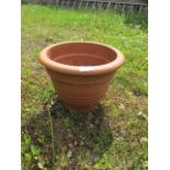 A MISCELLANEOUS COLLECTION OF TERRACOTTA AND ENAMELED PLANTERS including three wall mounted demi -