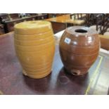 TWO GLAZED POTTERY WHISKEY BARRELS one brown one yellow of typical form