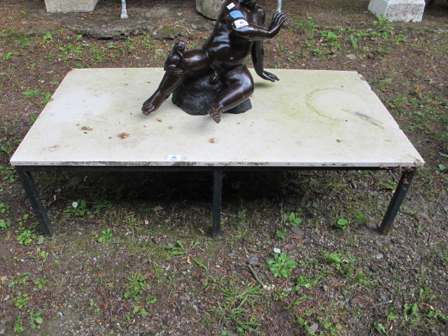 A RECTANGULAR MARBLE TOPPED LOW TABLE ON METAL SQUARE SHAPED SUPPORTS 35cm x 123cm x 63cm