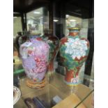 A PAIR OF CLOISONNE VASES each of baluster form together with a similar vase (3)