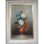 20TH CENTURY FLOWERS IN A VASE A Pair Each signed lower right Oil on Canvas 29cm x 24cm
