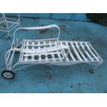 A WHITE PAINTED WROUGHT IRON GARDEN RECLINER of rectangular form with adjustable back shaped open