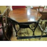 AN EDWARDIAN MAHOGANY OCCASIONAL TABLE the octangular shaped top with moulded rim above the waved