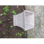 A PAIR OF COMPOSITION STONE PLANTERS each of square tapering form with loral ? decoration 51cm