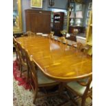 A REGENCY STYLE DINING ROOM TABLE TOGETHER WITH A SET OF EIGHT CHAIRS en suite the burr walnut