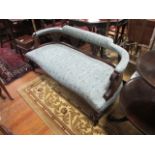 A EDWARDIAN MAHOGANY CARVED SOFA the raised upholstered back with rounded corners and pierced