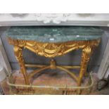 A CONTINENTAL STYLE MARBLE TOP CONSOLE TABLE the green shaped marble top above a grecian carved