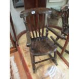 A GEORGIAN STYLE MINIATURE HARDWOOD ROCKING CHAIR