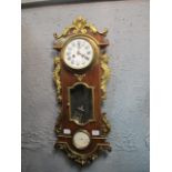 A FRENCH STYLE KINGSWOOD AND GILT BRASS MOUNTED WALL CLOCK the white enamel dial with black roman