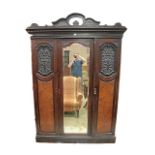 AN EDWARDIAN MAHOGANY AND BURR WALNUT THREE DOOR WARDROBE,