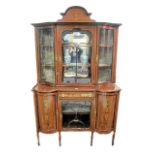 AN EDWARDIAN MAHOGANY AND MARQUETRY INLAID DISPLAY CABINET the top with raised pediment centred by