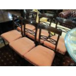 A SET OF SIX MAHOGANY REGENCY STYLE DINING ROOM CHAIRS the rectangular open backs above salmon
